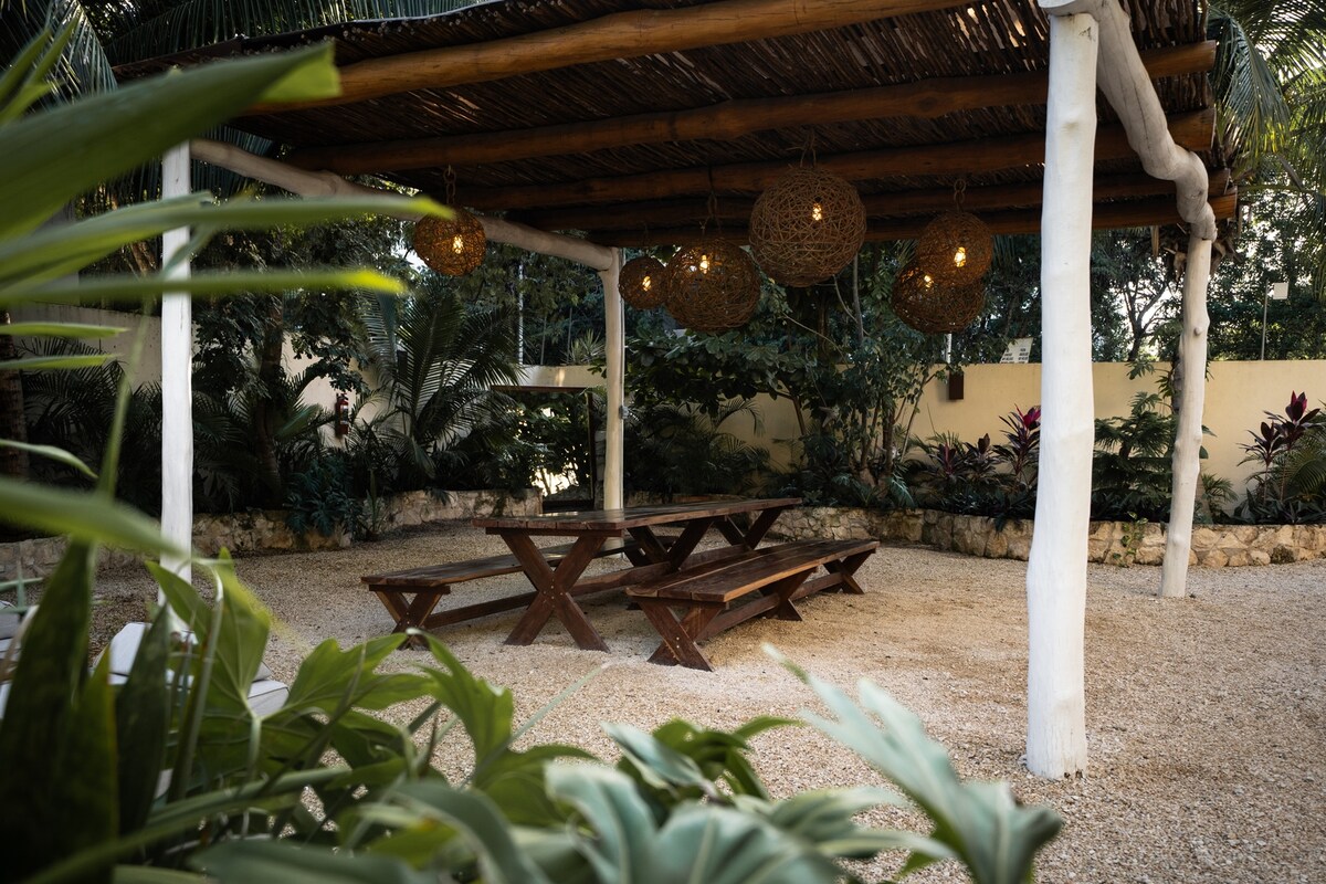 Covered outdoor dining area in the garden